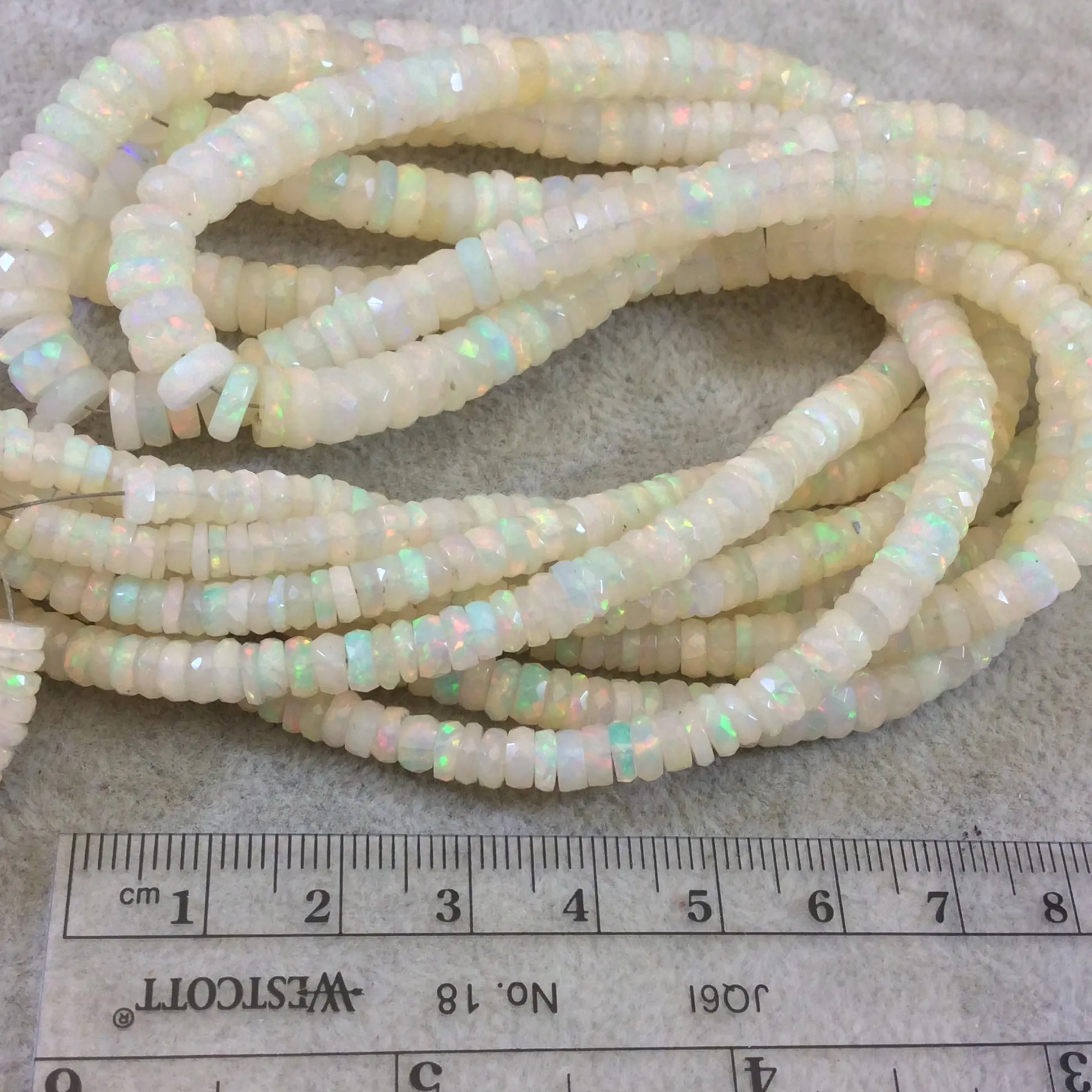 4-7.5mm Faceted Rainbow Pinfire Ethiopian Opal Graduated Heishi Shaped Beads - 17" Strand (Approx. 194 Beads) - High Quality Indian Gemstone