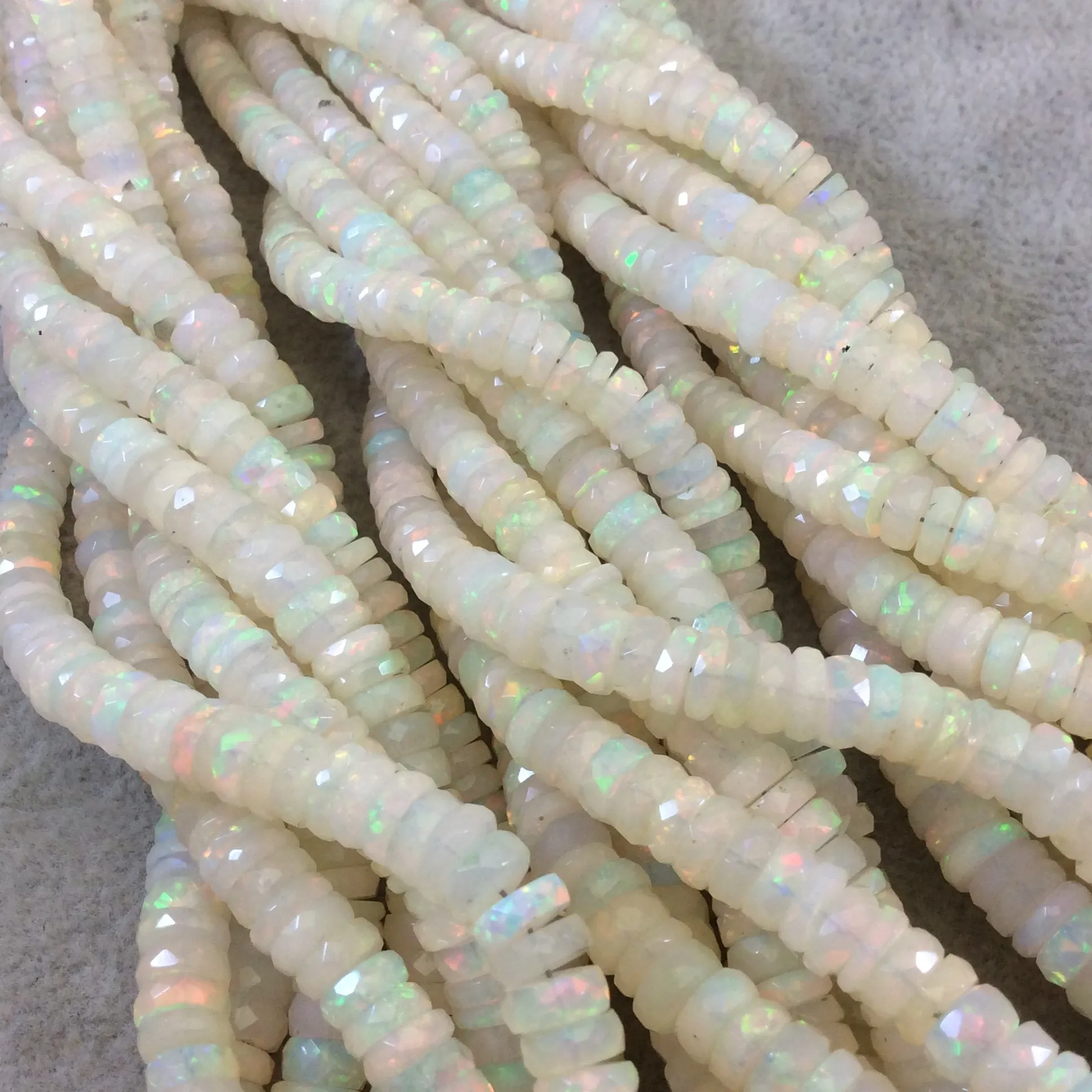4-7.5mm Faceted Rainbow Pinfire Ethiopian Opal Graduated Heishi Shaped Beads - 17" Strand (Approx. 194 Beads) - High Quality Indian Gemstone
