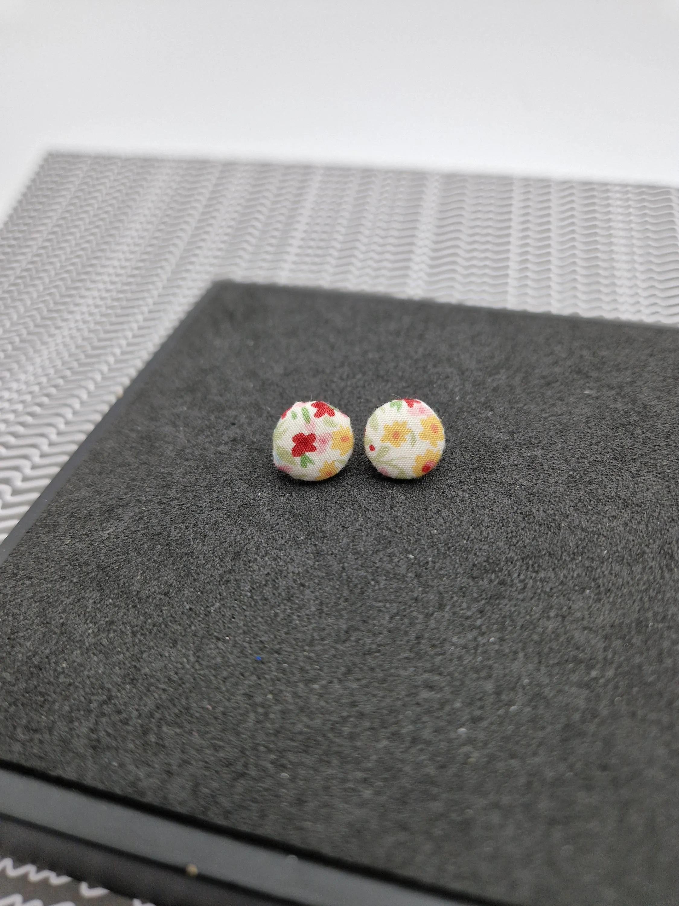 Bold and bright button stud earrings.