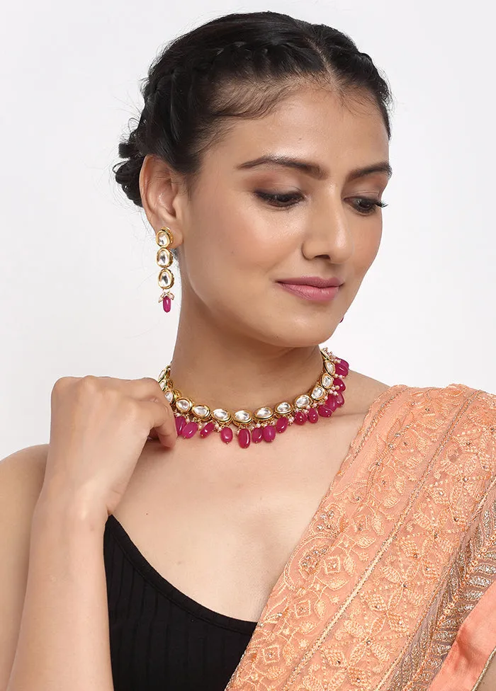 Gold Plated Kundan Jewellery Set With Magenta Beads