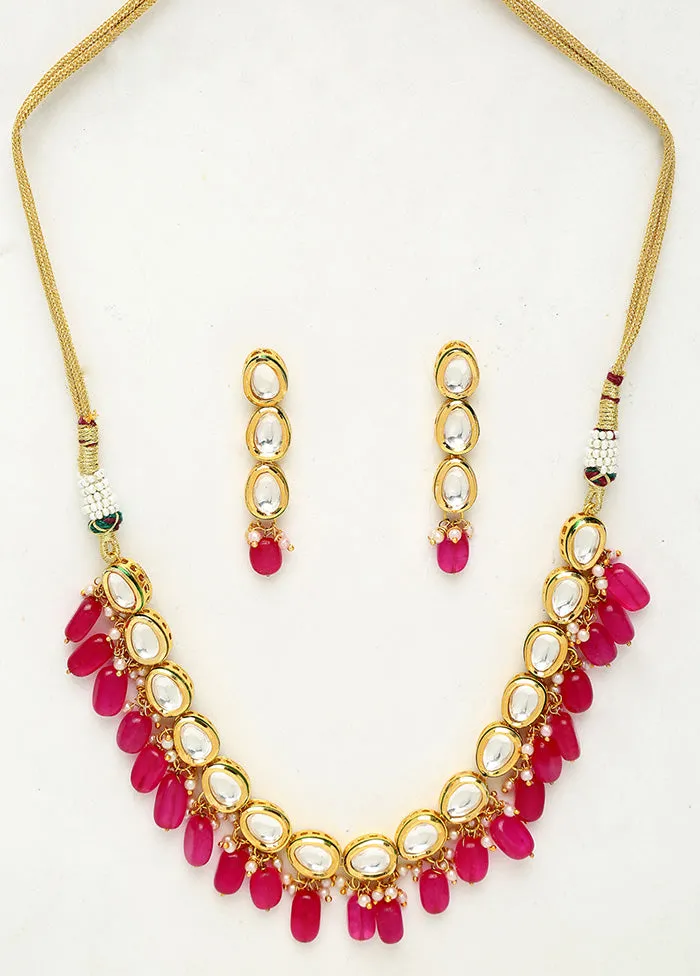 Gold Plated Kundan Jewellery Set With Magenta Beads