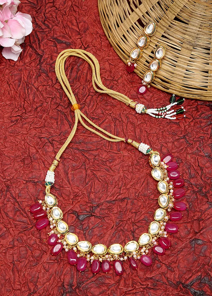 Gold Plated Kundan Jewellery Set With Magenta Beads