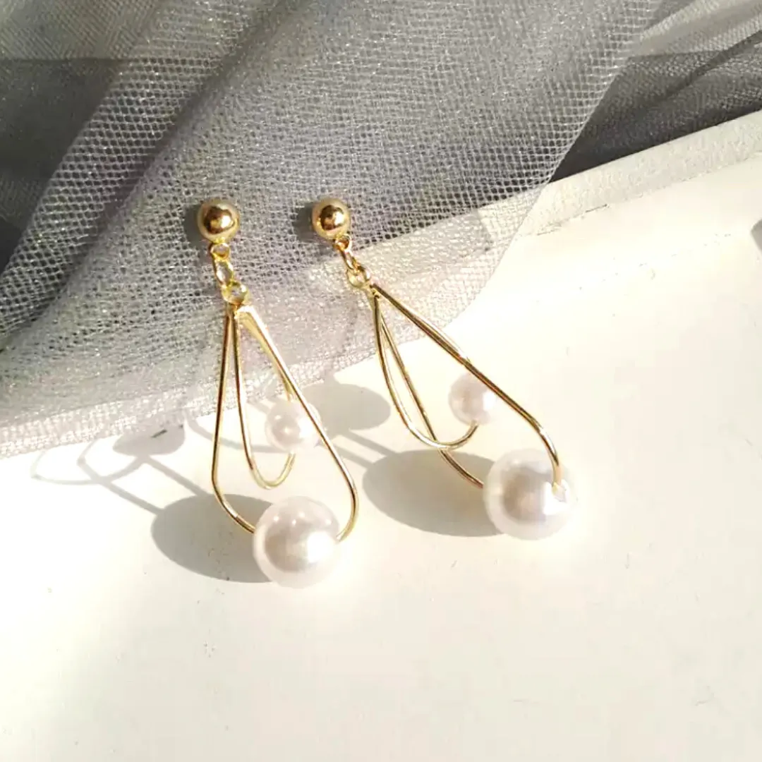 Graceful Dangle Teardrop Double Pearl Clip On Earrings