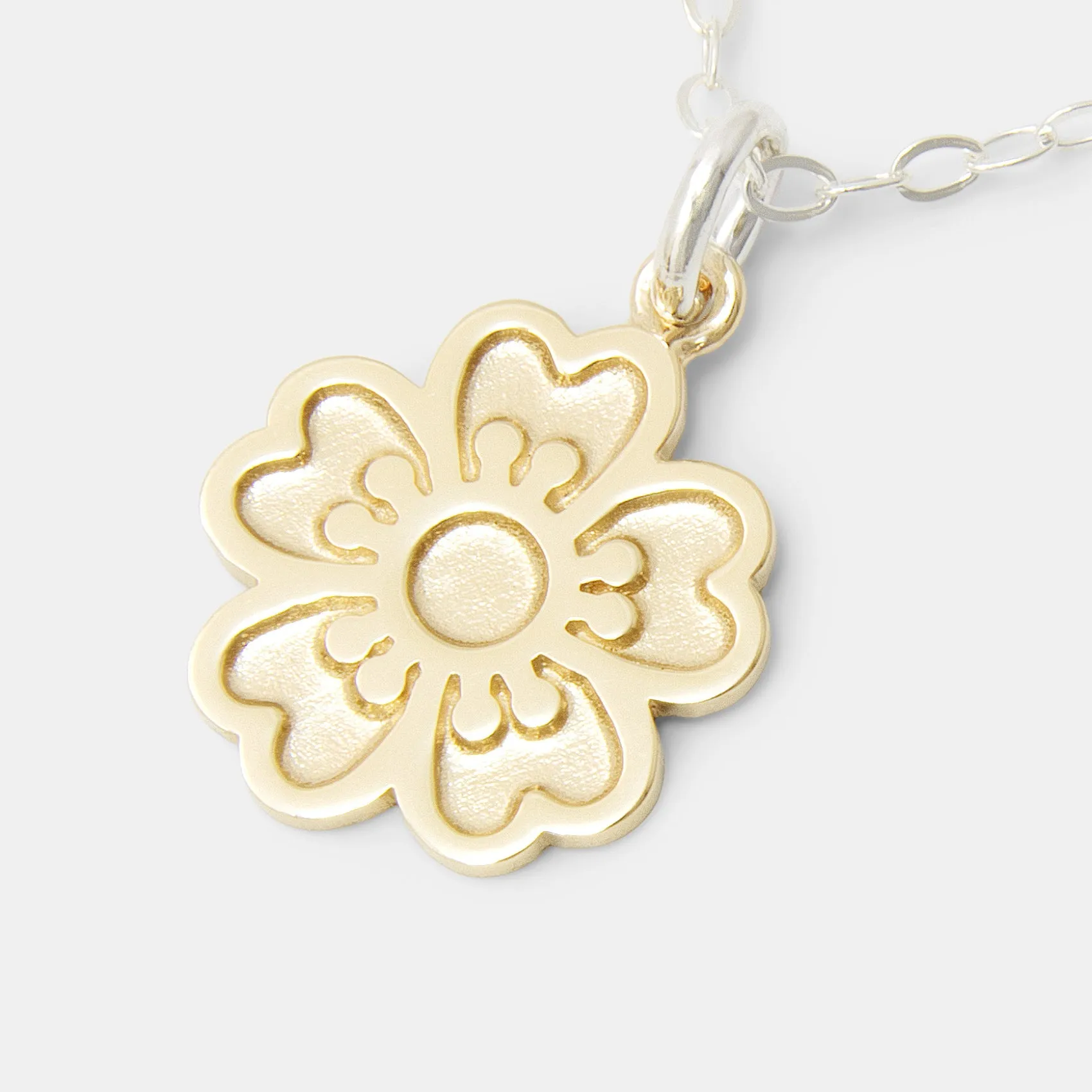 Guinea Flower Solid Gold Pendant on Silver Necklace