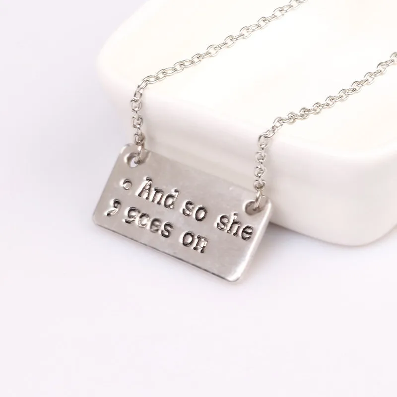 Hand Stamped "And So She Goes On" Charms Pendant Necklace