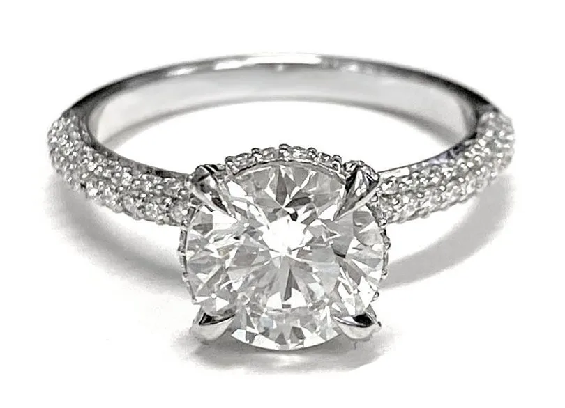 Platinum Round Brilliant Diamond Encrusted Claws and Triple Pave Engagement Ring -1/2ctw