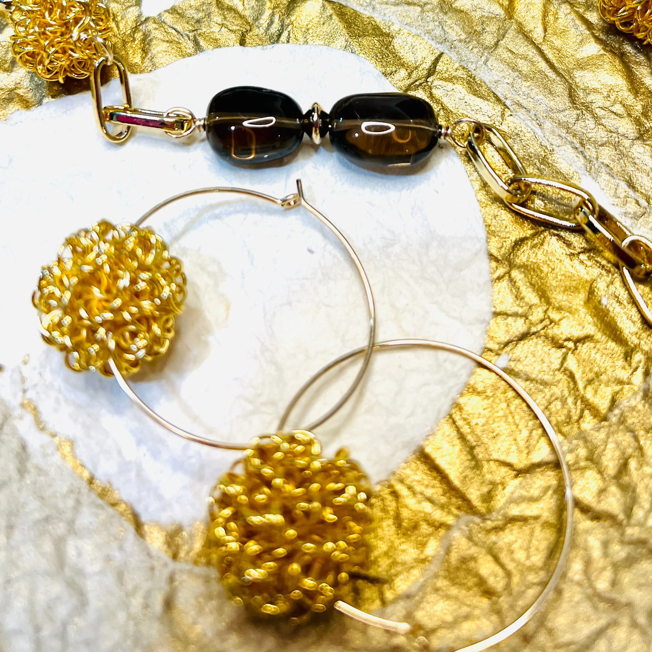 Rising Sun Gold Woven Ball Hoop Earrings