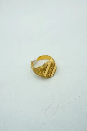 Understated yellow gold signet ring with engravings