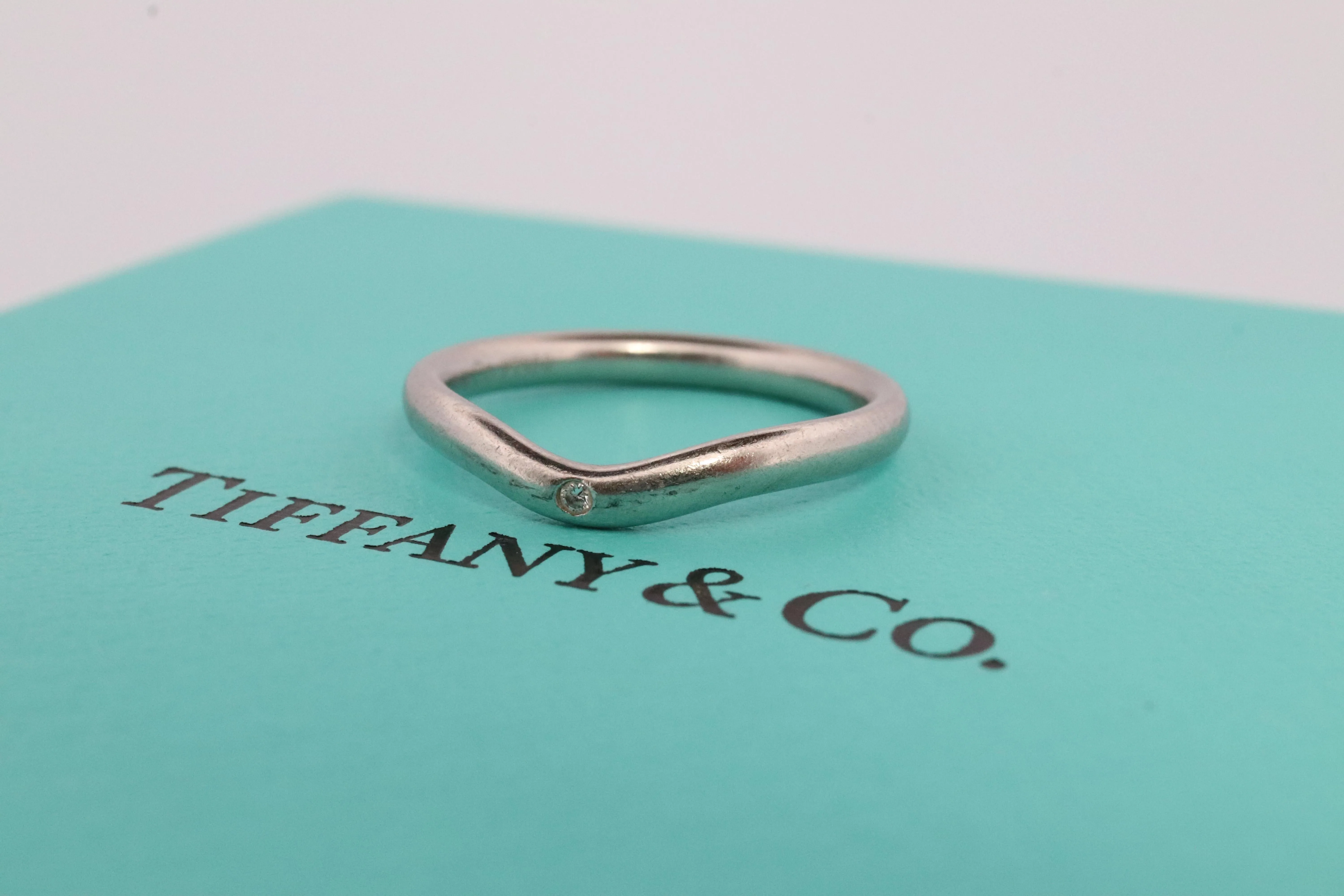 Vintage Tiffany and Co. Diamond Platinum Ring. Tiffany Curve PT950 band.